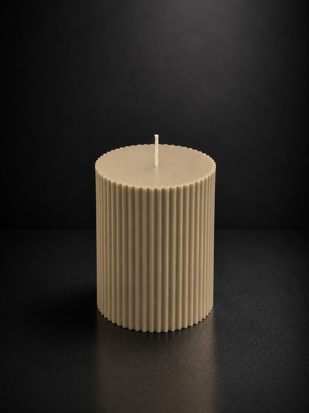 Large ribbed sculptural candle in Cashmere, hand-poured by Glow Pantry.