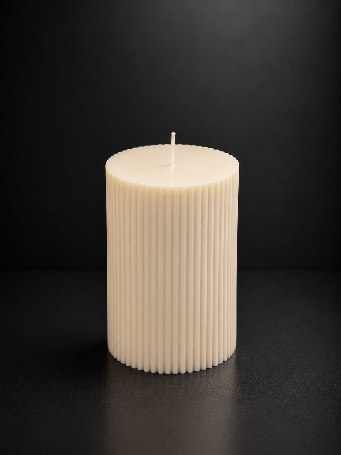 Large ribbed sculptural candle in Parchment, hand-poured by Glow Pantry.