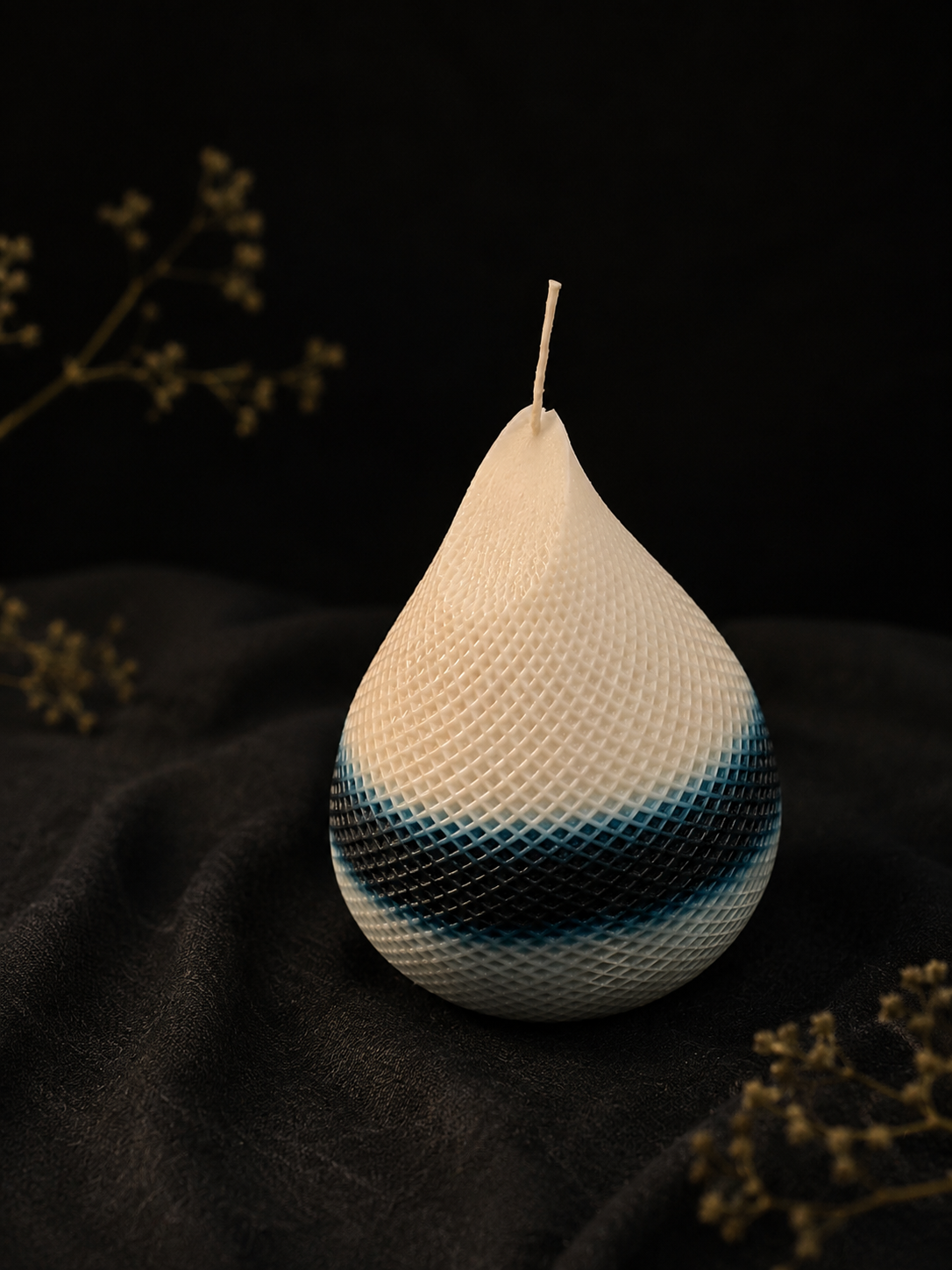 Midnight Veil sculptural teardrop candle with layered ivory and midnight tones from Glow Pantry Studio Rarities.