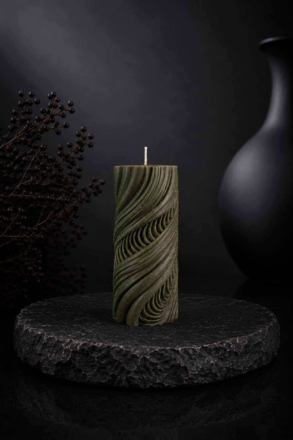 Obsidian Current sculptural candle in Moss, featuring flowing carved contours and deep olive-green tones from Glow Pantry’s Lowlight Series.