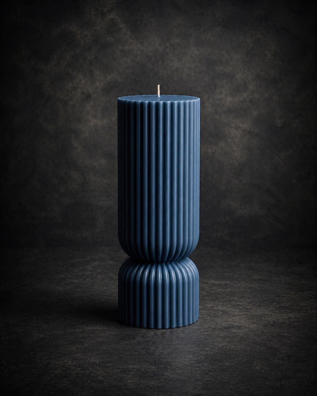 Luxury Atelier Grand sculptural candle in Slate by Glow Pantry with a fluted architectural design.